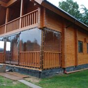 п. Вавиловец. Изготовлены мягкие окна на веранду жилого дома из профилированного бруса.